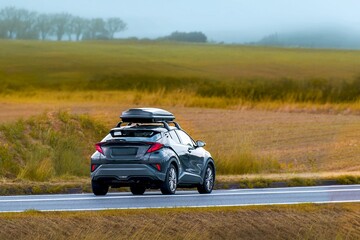 Holiday journey concept with car and cargo carrier © AlexGo