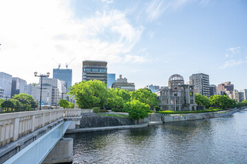 Atomic Bomb Dome Against Blue Sky with Green Trees and Copy Space © 亀山 篠介