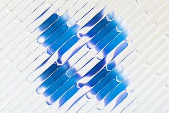 3D blue glass capsule grid with diagonal technology flow