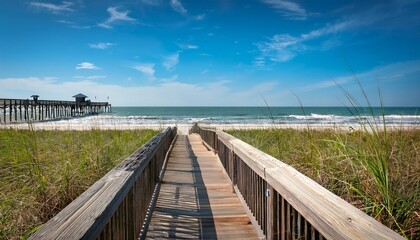 Naklejka premium Atlantic Ocean Background Boardwalk Through Dune Grass To The Atlantic Ocean With A Pier In The Background Myrtle Beach South Carolina