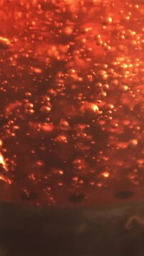 Super slow motion black tea is brewed with air bubbles. Macro background. Filmed on a high-speed camera at 1000 fps.