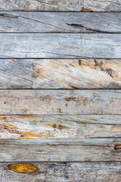 Weathered kelohonka logs with rustic natural texture