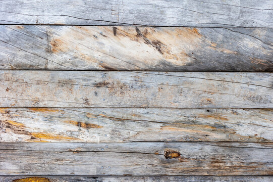 Weathered kelohonka logs with rustic natural texture