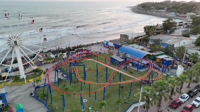 Aerial view of Sunset Park Amusement Rides by the Pacific Coast in La Libertad, El Salvador