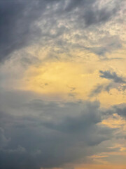 Obraz premium Storm Clouds Surrounding Warm Evening Light