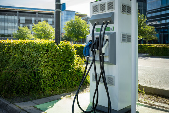 Fuel pumps at gas station on street