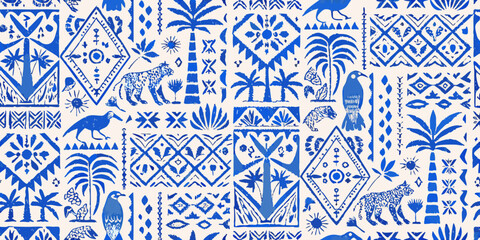 blue tropical pattern with leopards toucans and palm leaves © Minati