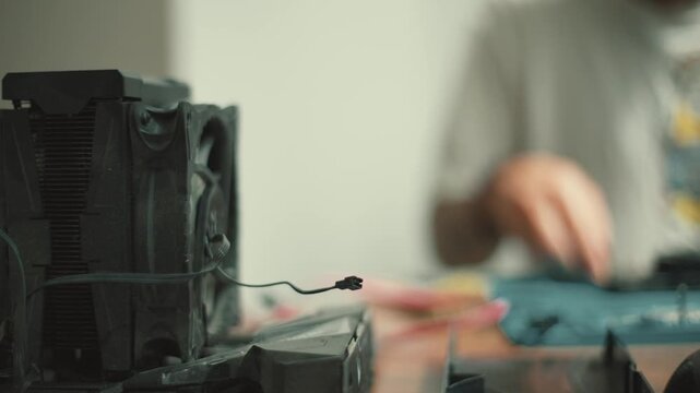Clothes being repaired in a workshop in the afternoon with tools and sewing machines visible