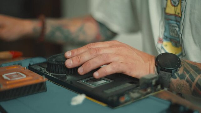 Fixing a vintage electronic device in a workshop on a sunny afternoon