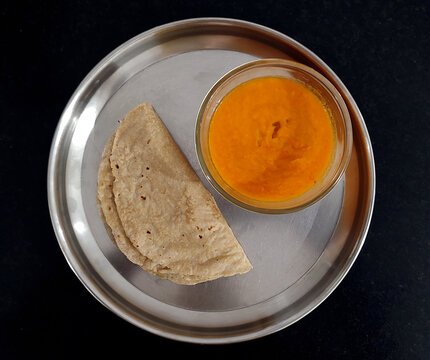 Aamras and chapati a summer holiday delicious sweet for Lunch and Dinner