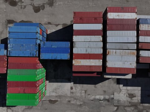 Aerial view of colorful shipping containers stacked in rows at a logistics terminal Cincinnati, OH, United States.