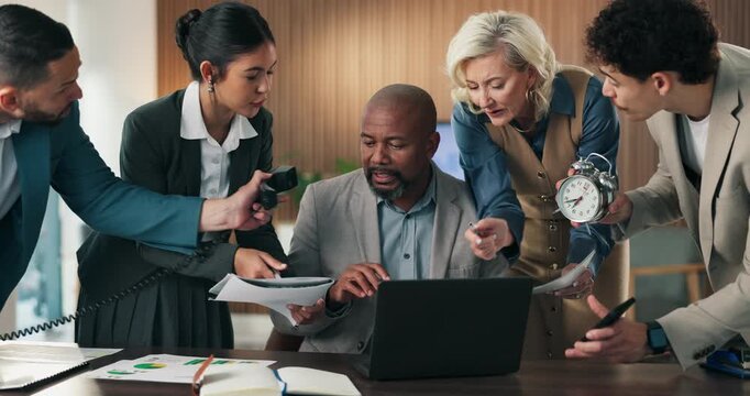 Multi tasking, documents and business people in office with chaos for finance project with laptop. Heavy workload, phone call and mature male financial manager with colleagues for investment proposal