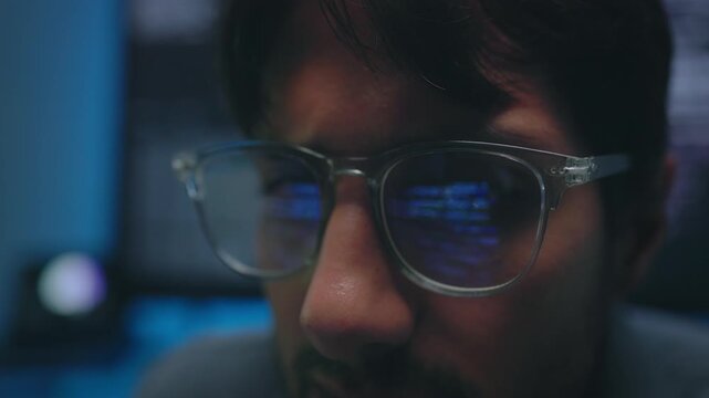 Focused Programmer Face Code Reflection in Glasses Slow Motion