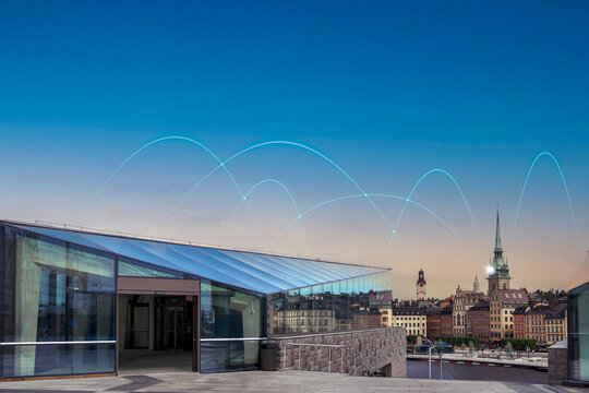Digital blue arcs seen in clear sky representing network with famous church