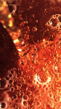 Super slow motion jet beer pours with air bubbles and foam. Macro background.Filmed on a high-speed camera at 1000 fps.