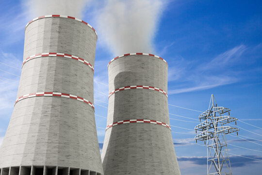 Cooling towers of nuclear power station against the blue sky
