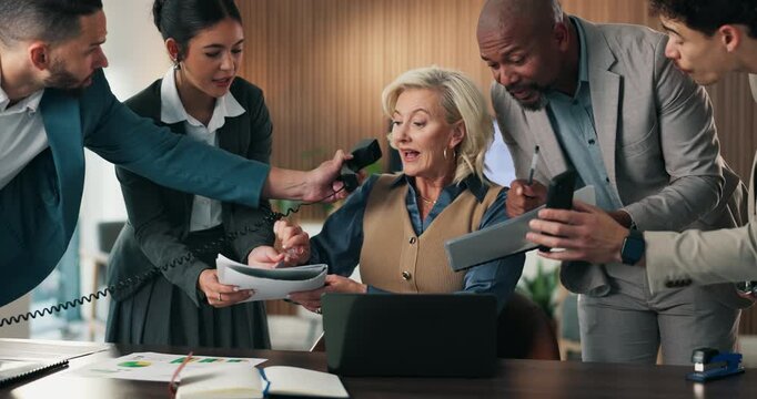 Multi tasking, paperwork and business people in office with chaos for finance project with laptop. Workload, phone call and mature female financial manager with colleagues for investment proposal.
