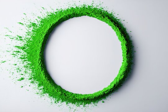 Vibrant green matcha powder ring scattered on white background in minimalist composition