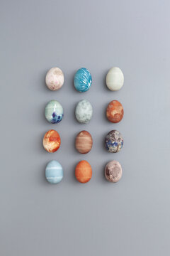 Row of decorative Easter eggs with various patterns and colors