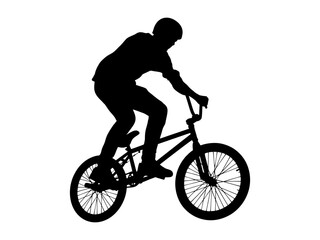 Fototapeta premium Silhouette of a male rider performing a trick on a BMX bike on white background