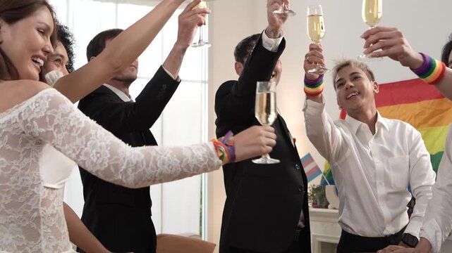Pride and LGBTQ festival concept. Celebrating equal marriage: men and women happily marry, toasting with white wine, clinking glasses, partying, and dancing together.