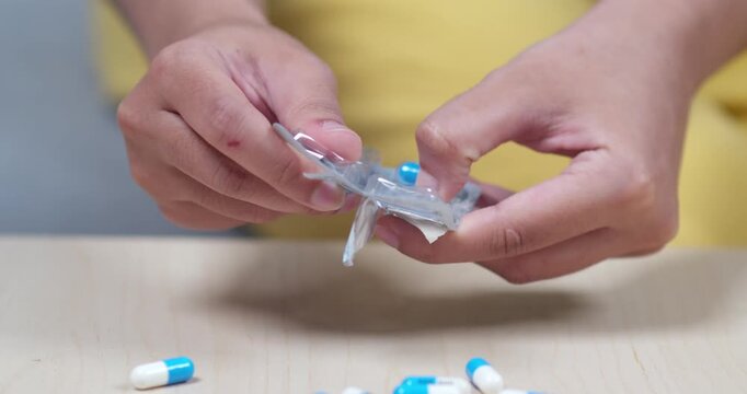 Learn an effective technique for opening pill packaging safely and easily.