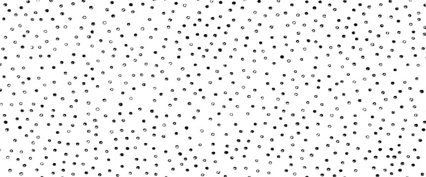 Black and white hand drawn polka dot pattern. irregular circles scattered across a white background