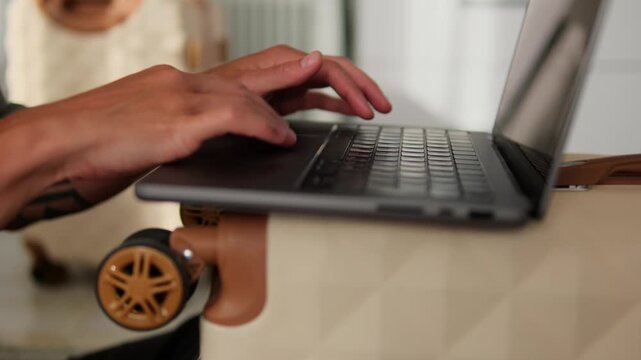 Digital nomad reality closeup of freelancer working on laptop placed on suitcases in rented apartment remote work during constant travel and relocation