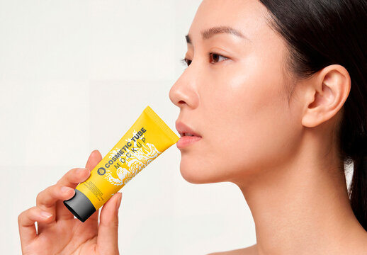 Cosmetic tube mockup with skincare model