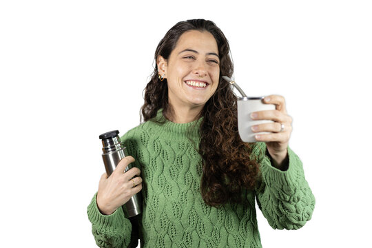 Happy woman holding mate and thermos smiling
