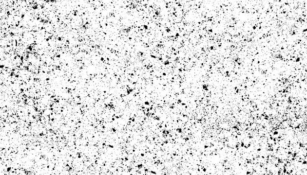 Distressed grit texture with black speckles, vintage grainy overlay for graphic design, monochrome noise pattern on white background