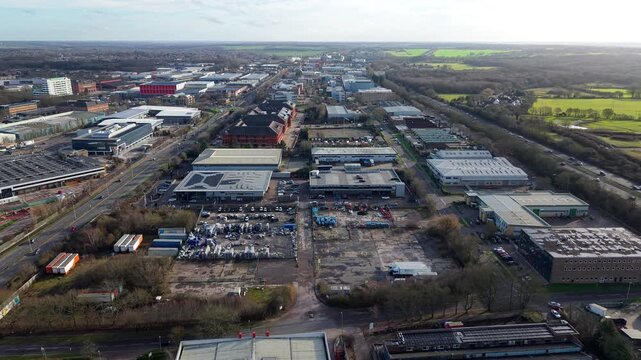 Drone view of specialized manufacturing facilities and tech-industrial buildings in the UK.