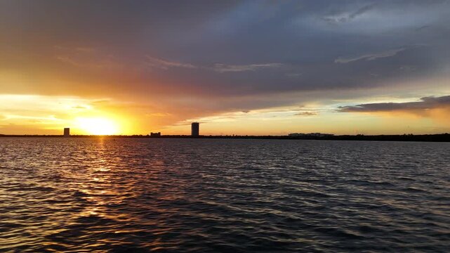 Drone Shot of Sunset Above Cancun and Caribbean Sea, Beautiful Sky, Reflections and Silhouettes, Mexico