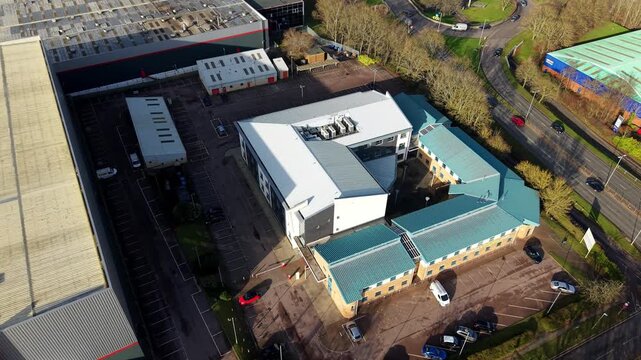 Aerial view of a modern industrial business district and logistics hub in Stevenage, UK.