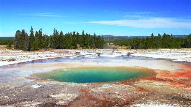 Opal Pool Grand Prismatic Spring Mid Geyser Basin Morning Glory Biscuit Basin Wyoming USA Yellowstone National Park colorful hot springs steaming thermal nature landscape blue sky clouds sunny