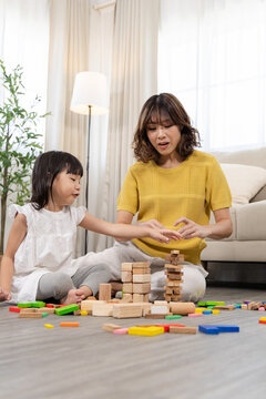 mother, daughter, family, education, homeschool happy child playing wooden toy block with parent, joyful learning, intelligence knowledge and emotional quotient, happy children play and learn