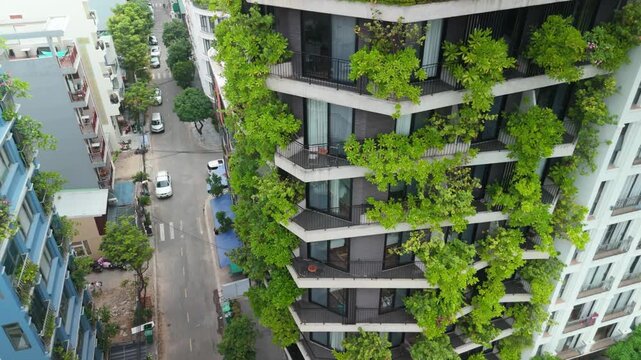 Modern high rise with lush vertical gardens and planted balconies, blending sustainable design and urban greening to create a vibrant, eco friendly city living facade