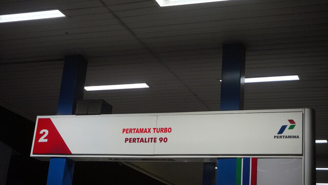 Purwokerto, Indonesia - 17 May 2026: Pertamina fuel station signboard displaying Pertamax Turbo and Pertalite 90 fuel types at pump number 2.