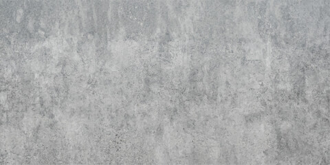 Fototapeta premium A grunge concrete wall texture with subtle variations in tone and light, creating a raw and industrial aesthetic.