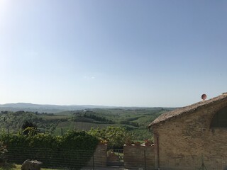 Fototapeta premium Panoramic View of Rolling Tuscan Hills and Vineyards in Siena Italy