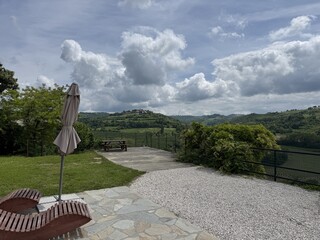 Fototapeta premium Scenic Terrace Overlooking Rolling Hills and Vineyards in Piedmont Italy