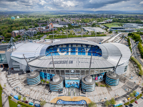 Etihad Stadium, Manchester City Football Club, aerial view of the modern football stadium and surrounding sports campus in Greater Manchester. 