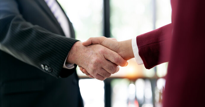 Close-up of Corporate Business People Shaking Hands