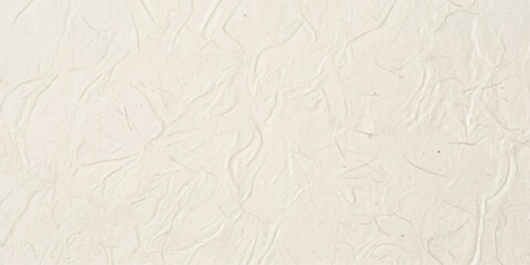 Fototapeta premium Creamy textured paper with subtle wrinkles, resembling a handmade or distressed parchment, offering a natural and organic background for design.