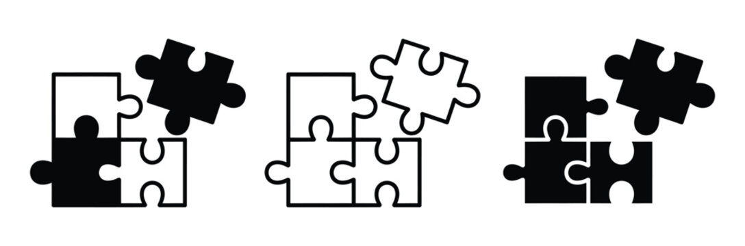 Three black and white puzzle pieces coming together to complete a jigsaw puzzle set