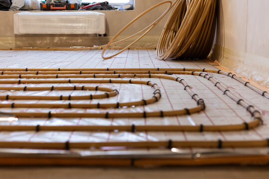 Underfloor water heating system. Selective focus.