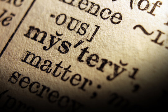 Word mystery on dictionary page, macro close up