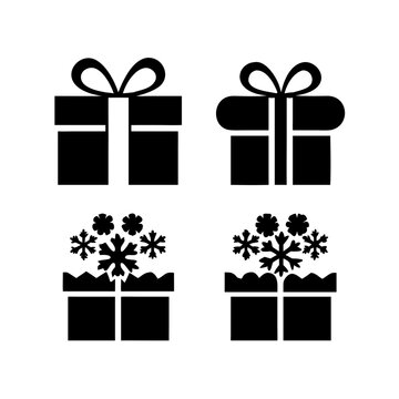 Black gift boxes with decorative bows and floral patterns Vector