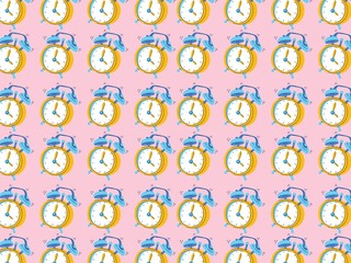 Obraz premium Pattern of vintage alarm clocks arranged in a grid on a pink background. Each clock has a yellow body with blue twin bells and black hands. The clocks are uniformly spaced, creating a repetitive desig