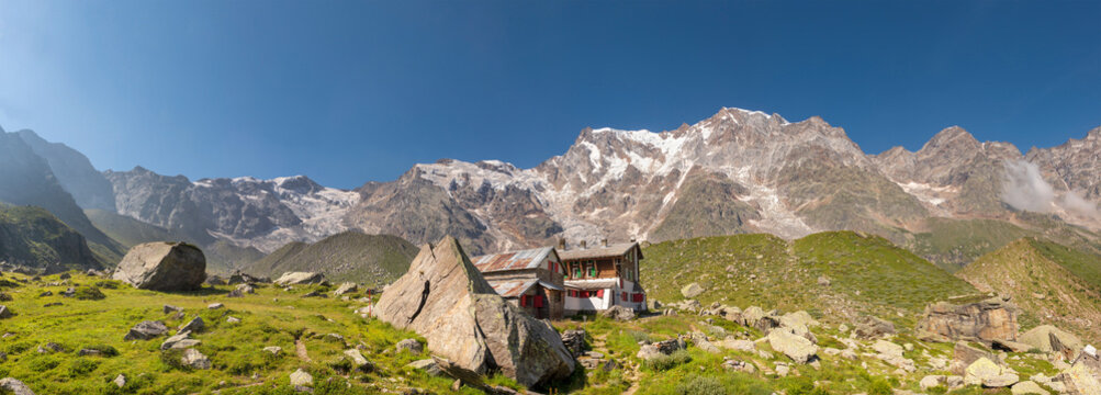 The panorama of Monte Rosa and Punta Gnifetti paks and the Rifugio Zambon Zappa chalet  - Valle Anzasca valley.